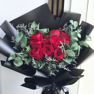 Fresh Red Roses with Green Leaf's